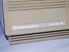 The logo of the Commodore PC 20-III computer.