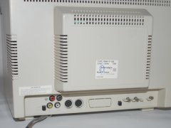 The backside of the Commodore 1084S monitor with several connections.